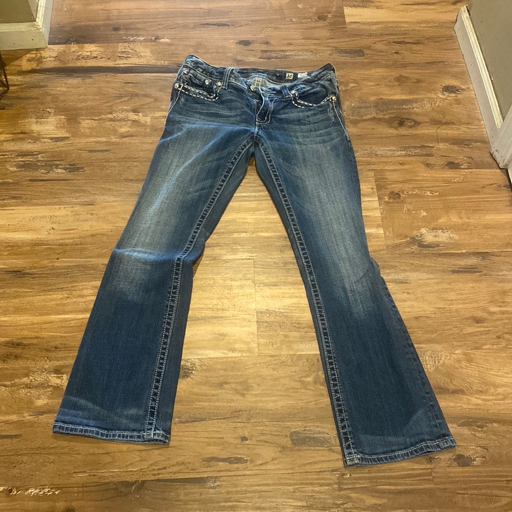 Miss Me Jeans, Size 30 with bling on back pockets.